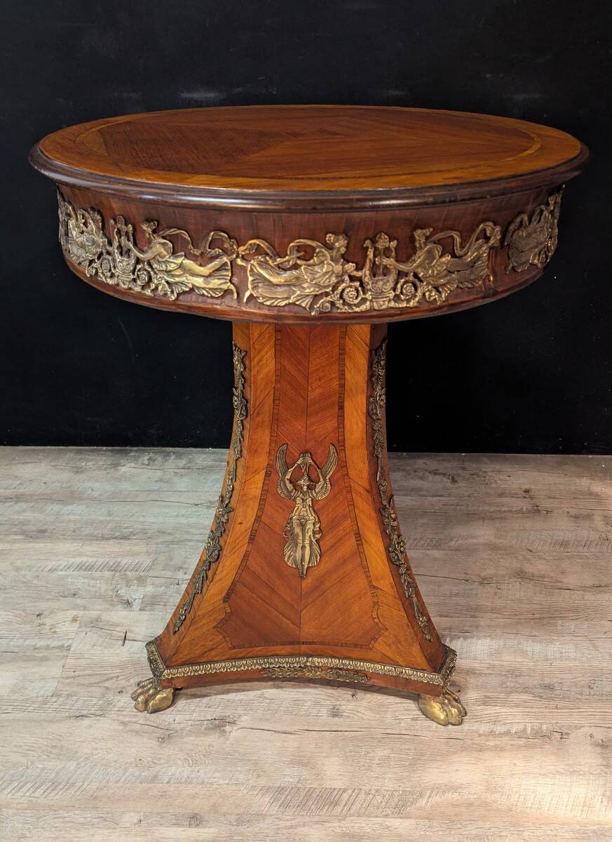 Circular gueridon in marquetry and bronze, Empire style