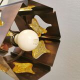 Older hanging lamp, made of metal with yellow prisms.