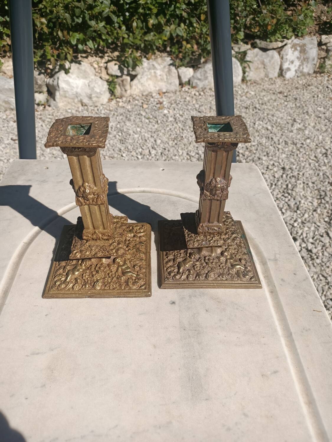 Financial-style candle holders in gilded bronze