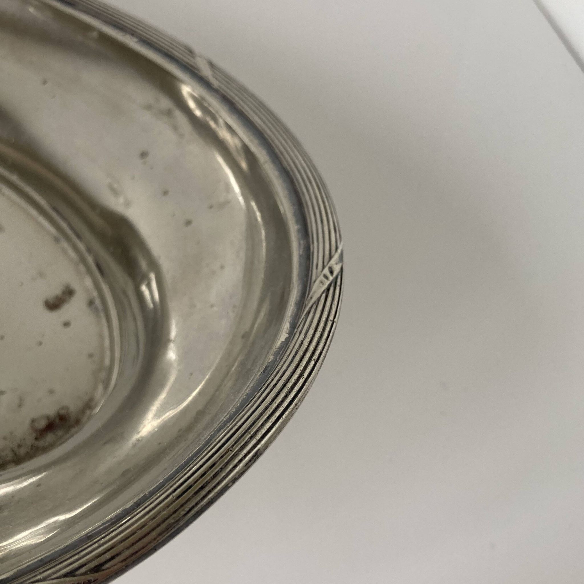 Oval silver-plated tray in the Louis XVI style by Mappin & Webb, London.
