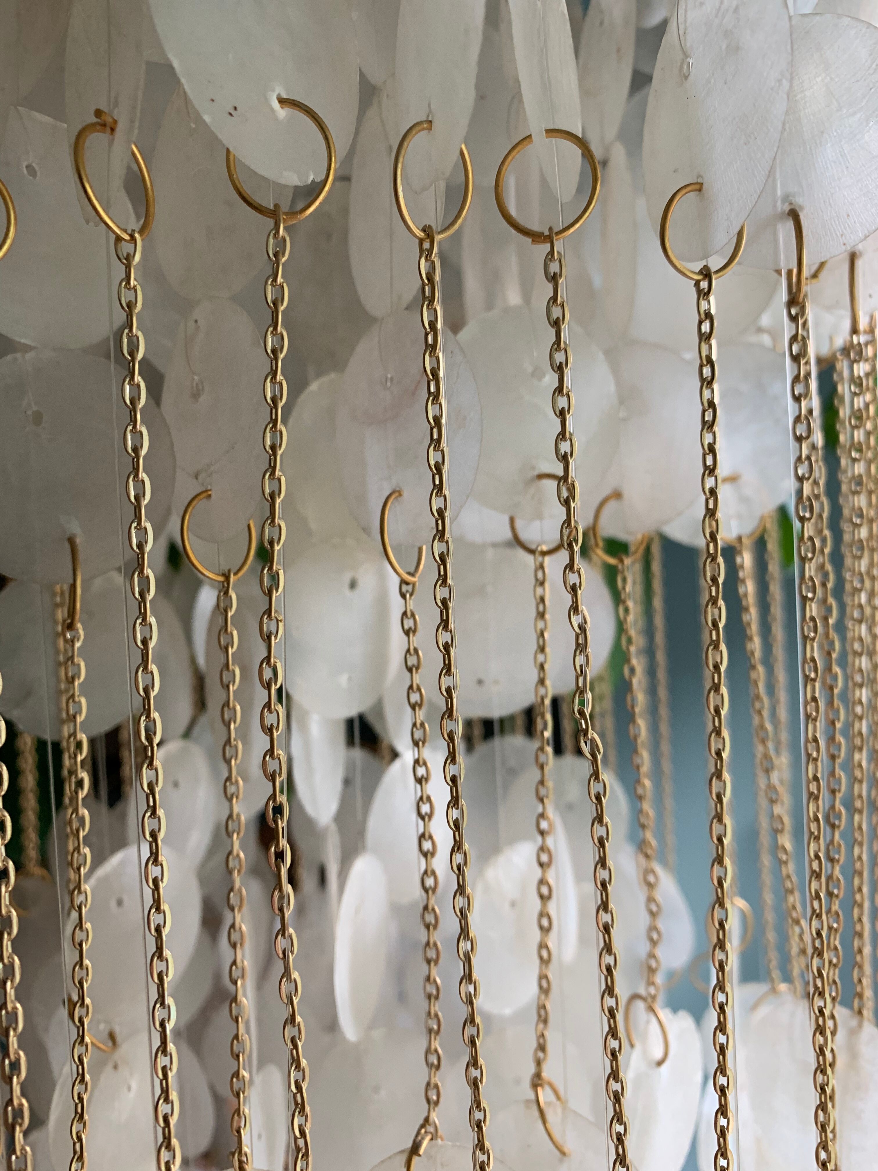 Suspension en pastille de nacre