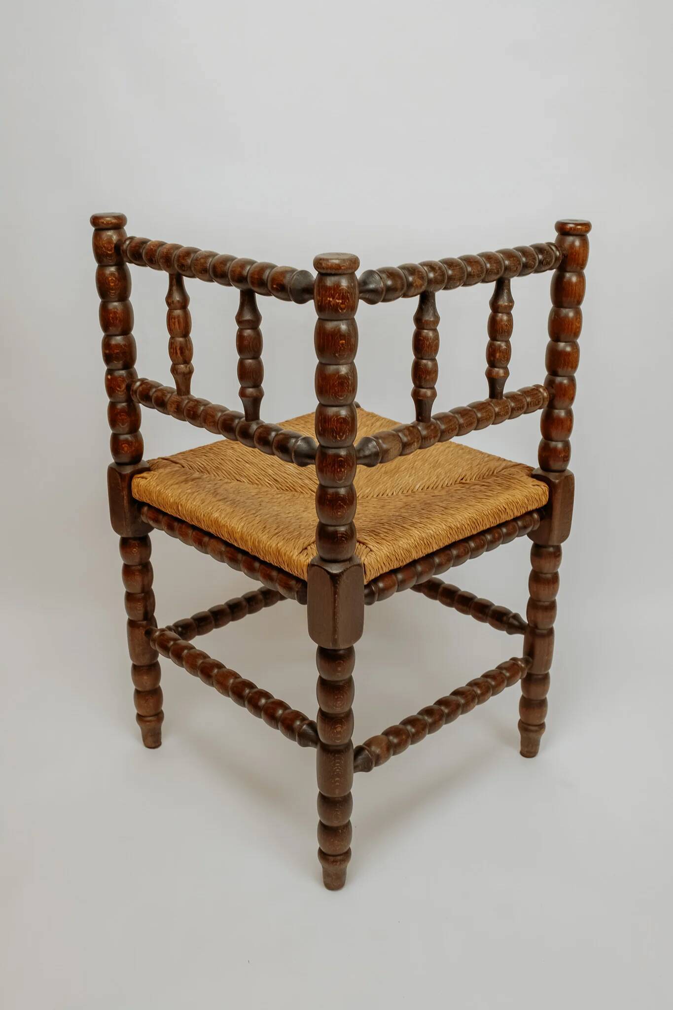 Classic vintage bobbin corner armchair