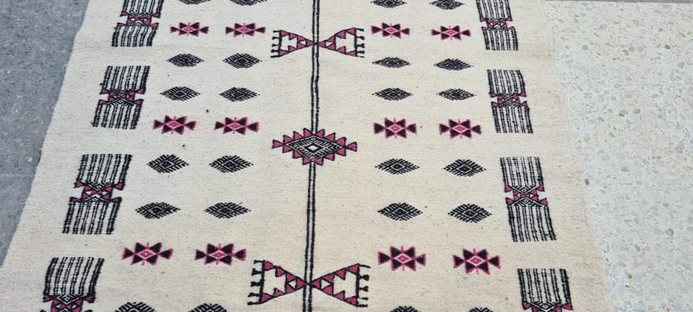 Hand-made black and pink white wool rug  210x105cm