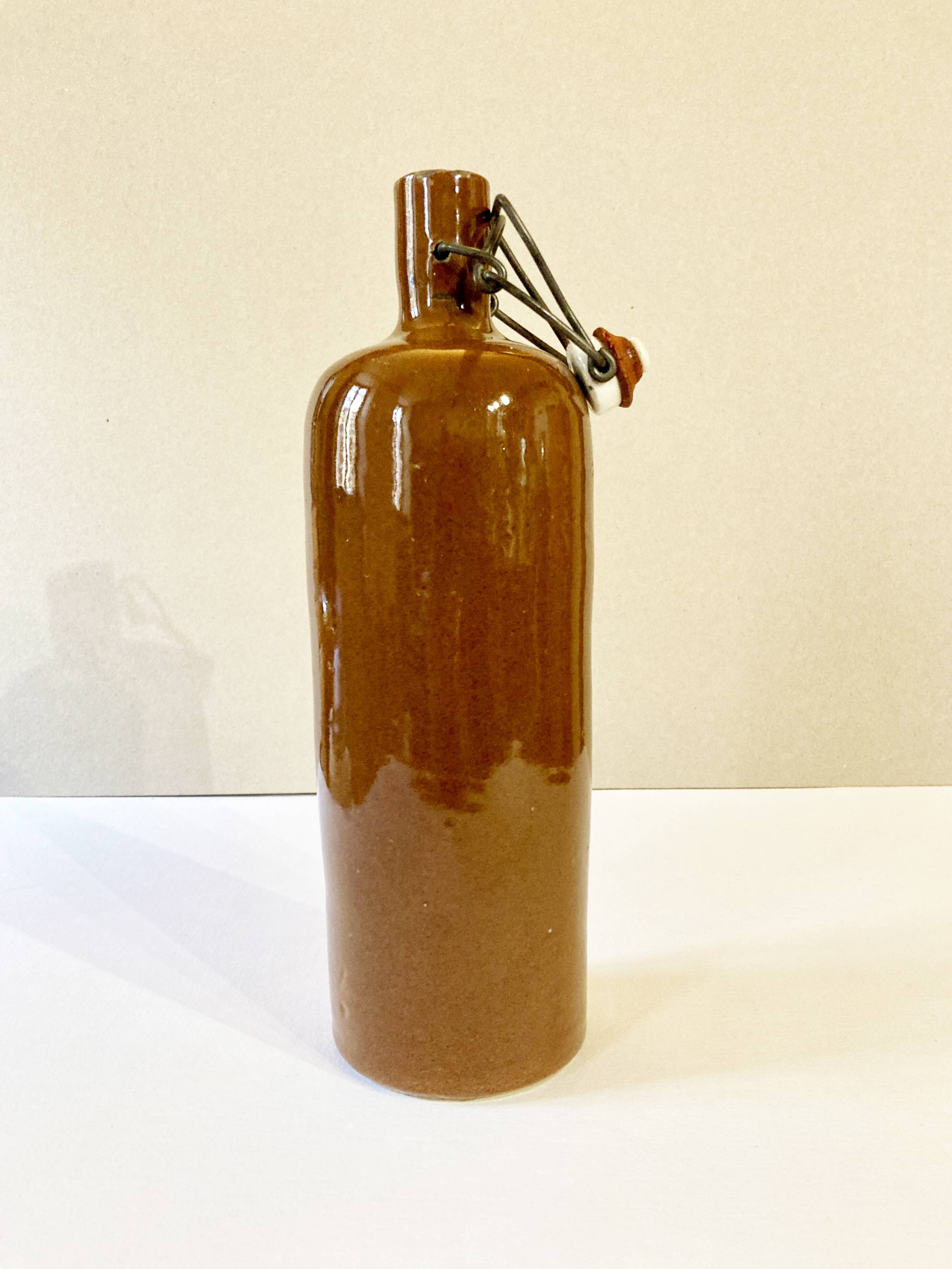 Bottle / hot water bottle in brown enamelled stoneware