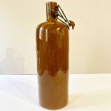 Bouteille / bouillotte en grès émaillé marron