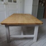 Coffee table made from a vintage farmhouse table in solid wood.