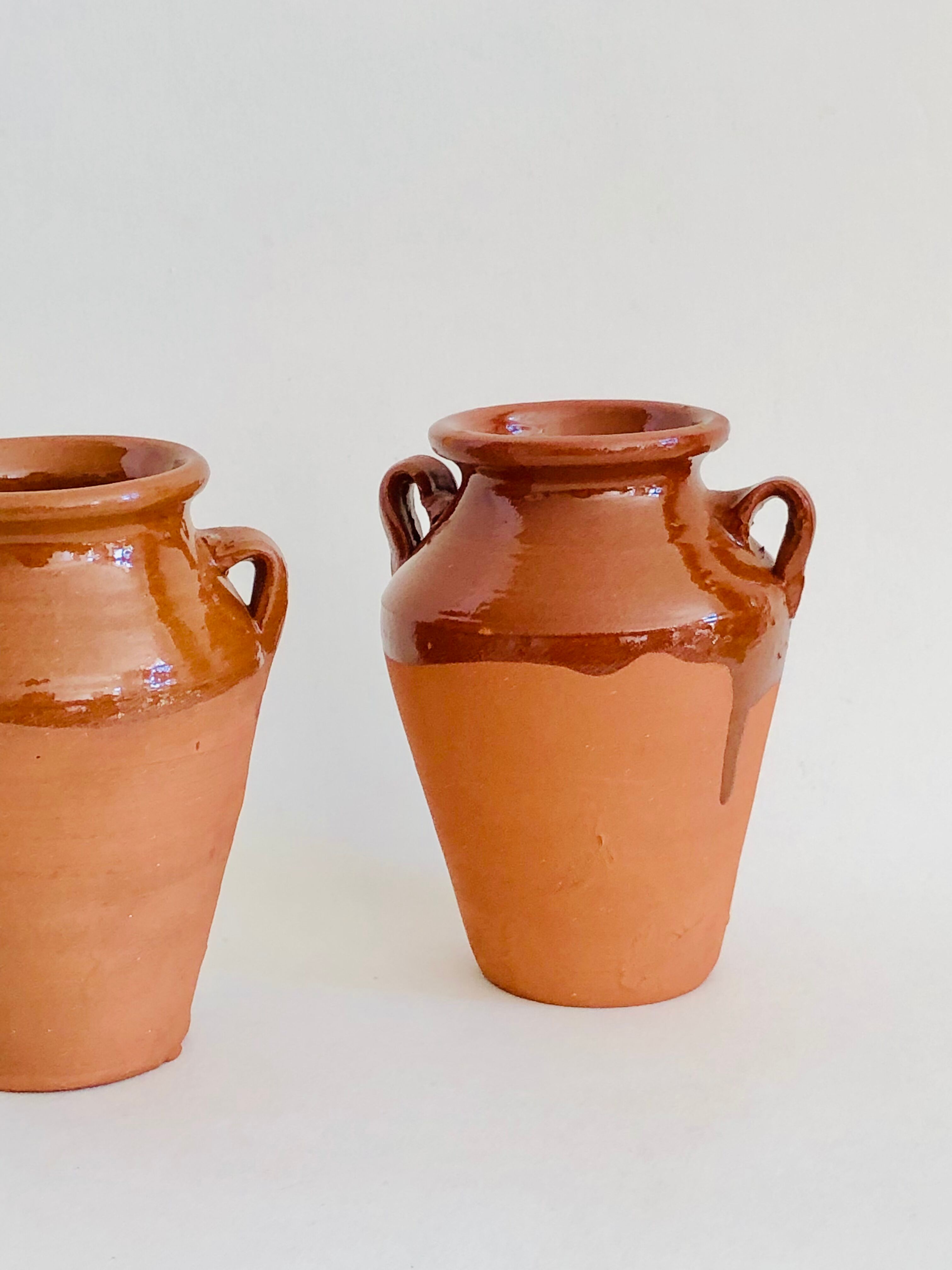 Pair of terracotta amphora vases