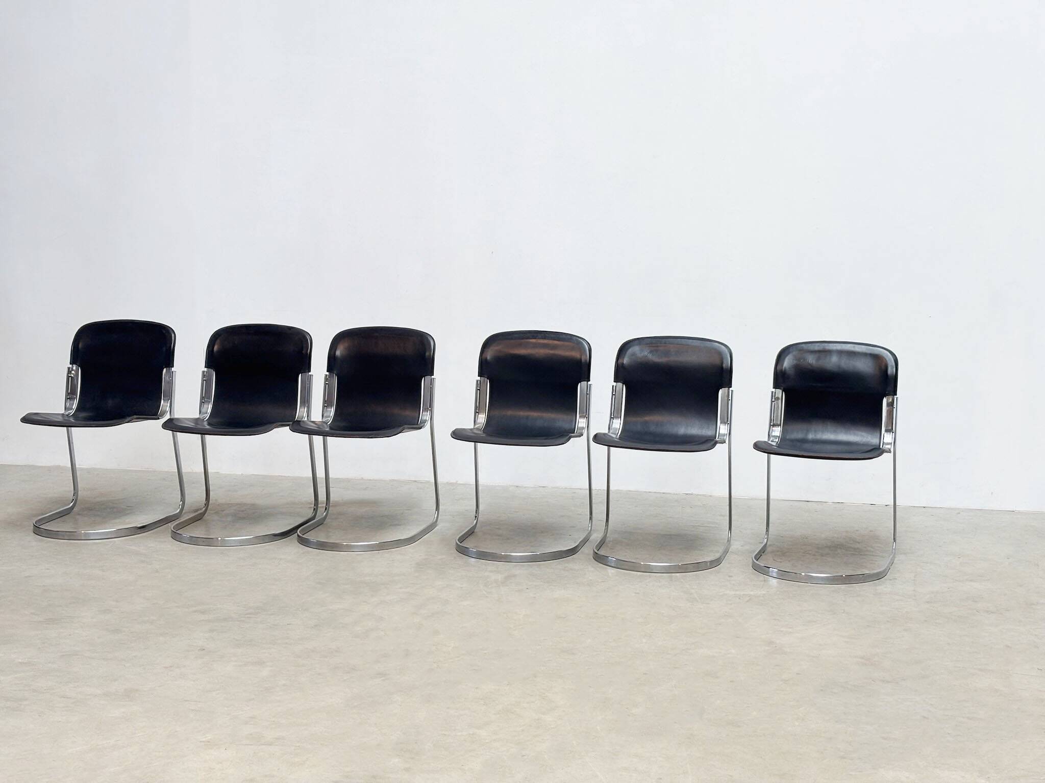 Set of six Willy Rizzo dining chairs in black leather