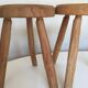Pair of tripod stools of farm in raw Elm