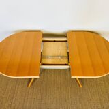 Vintage oval dining room table with extension