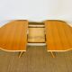 Vintage oval dining room table with extension