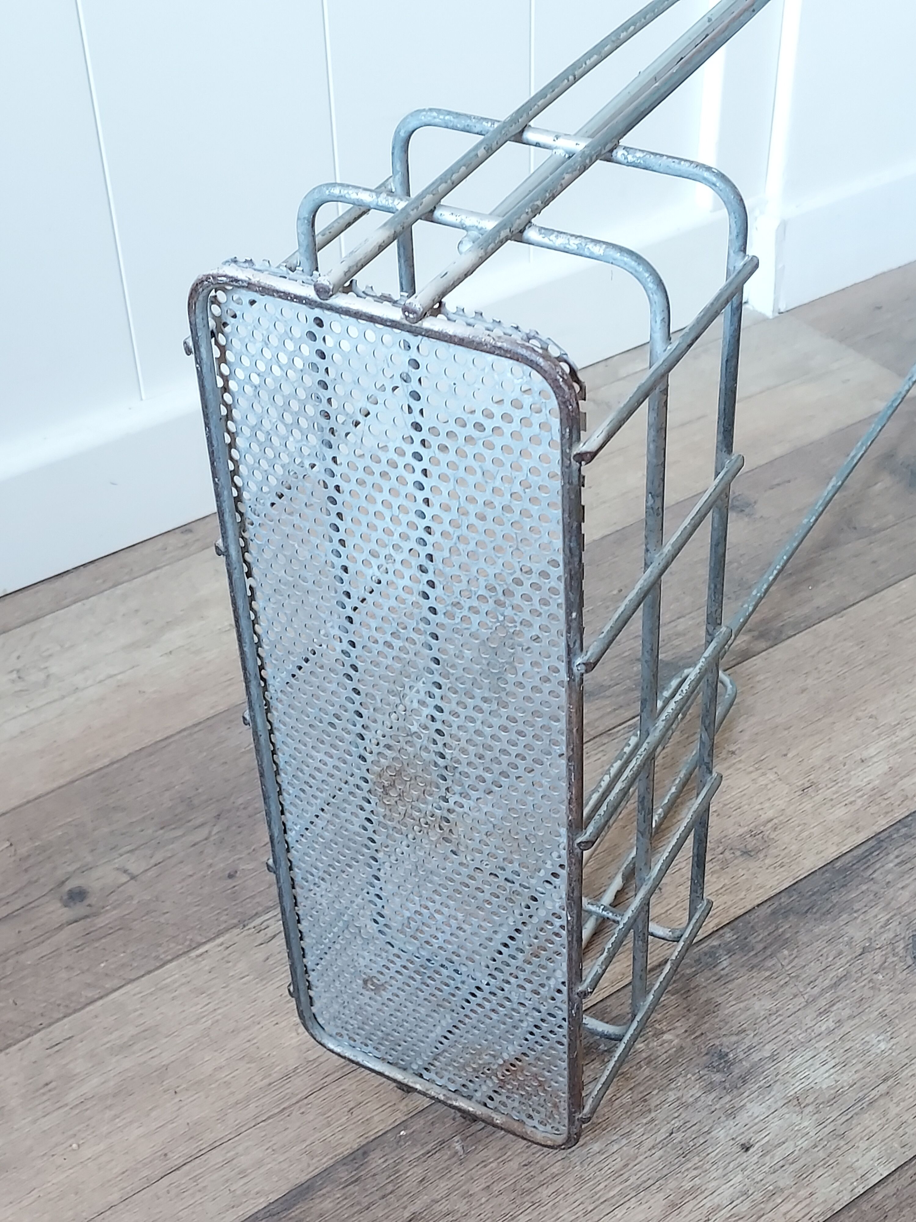 Antique perforated metal pool jack