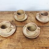 4 sandstone cups with under cups