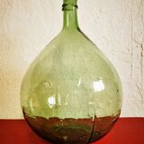 Green demijohn contains 12 liters