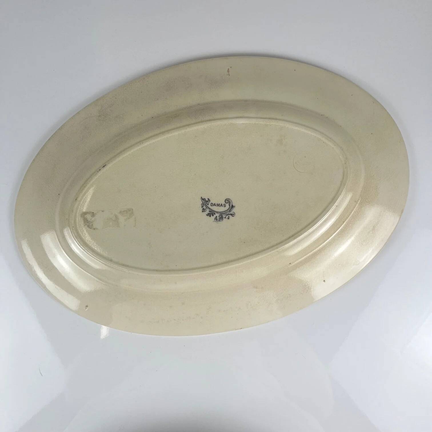 Large oval ironstone dish, "Damas" pattern by Sarreguemines, late 19th century, grey-black.