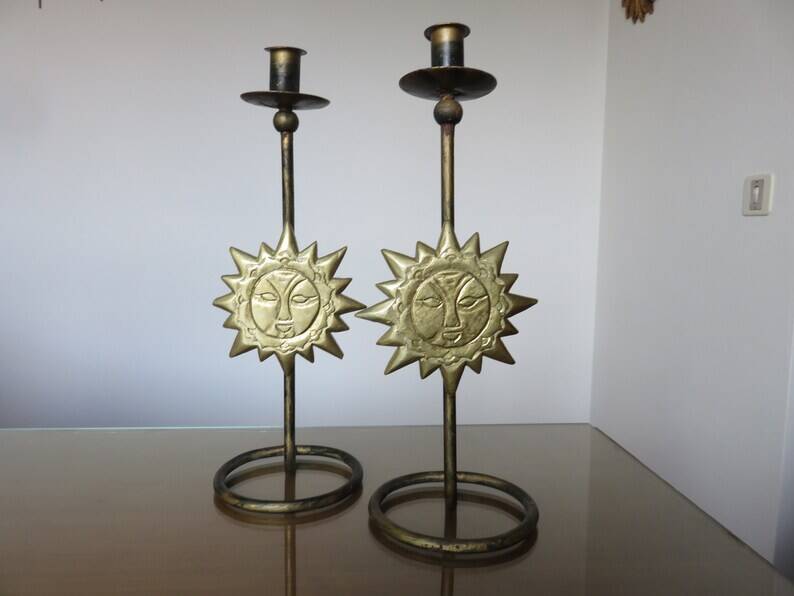 Pair of "sun" candlesticks in metal and wood from the 80s