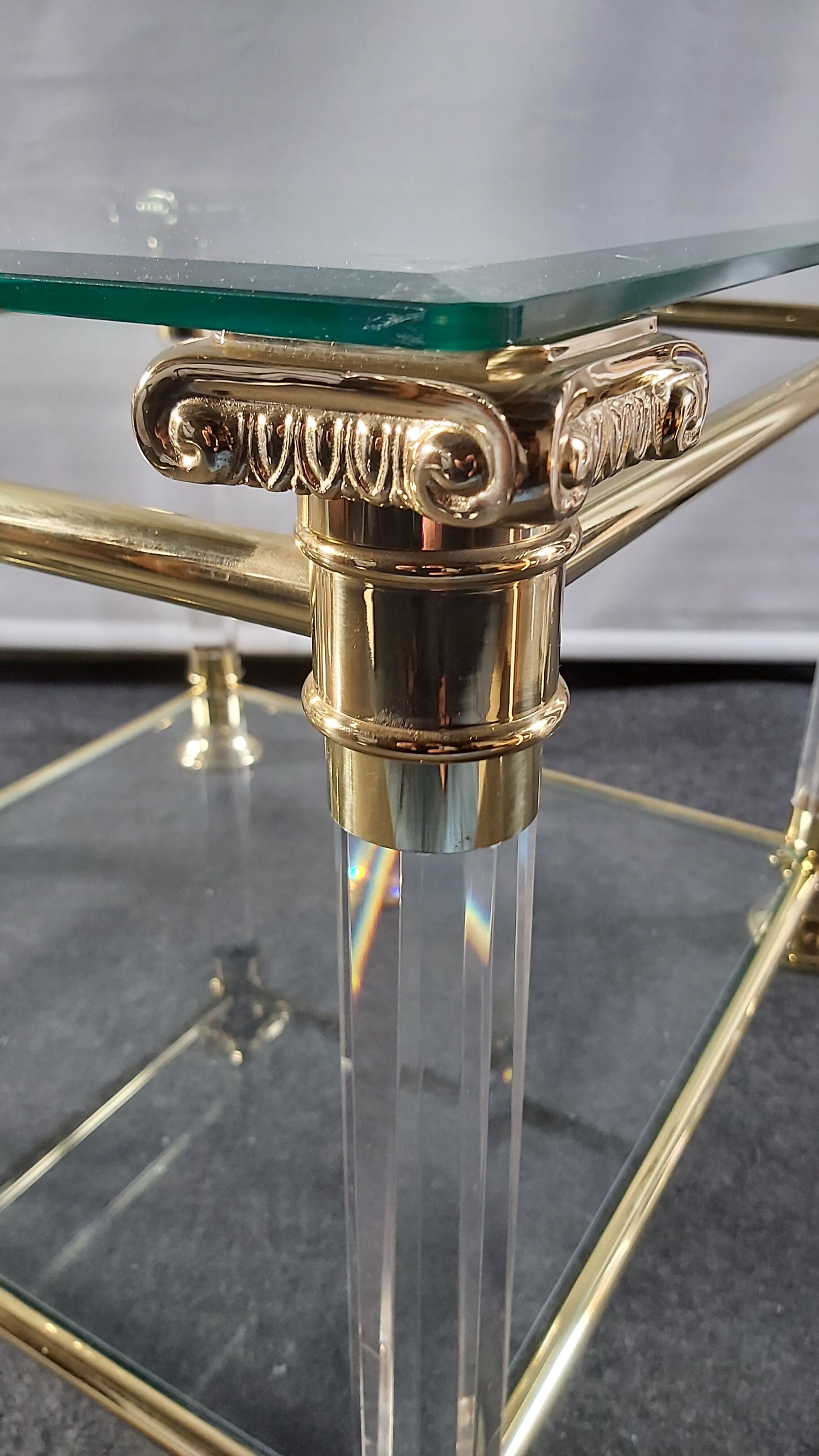 Pair of tables in brass, acrylic and glass