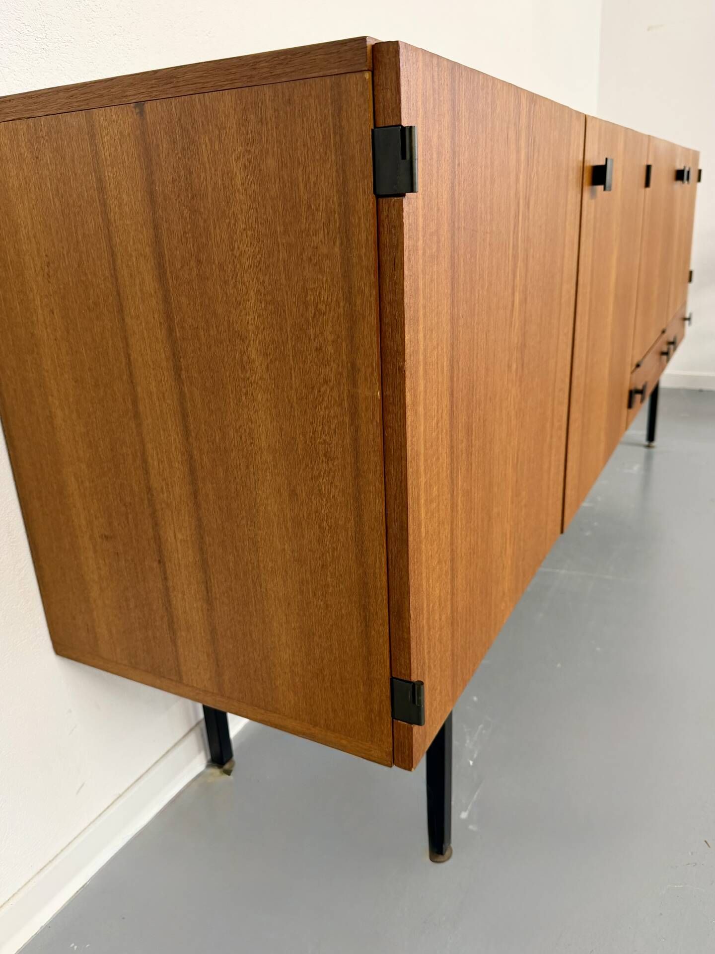 Vintage teak enfilade attributed to Gérard Guermonprez, 1960s design.