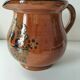 Glazed earthenware pitcher signed HR with a design of stylised birds.