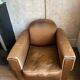 Vintage club armchair in brown fabrics to restore