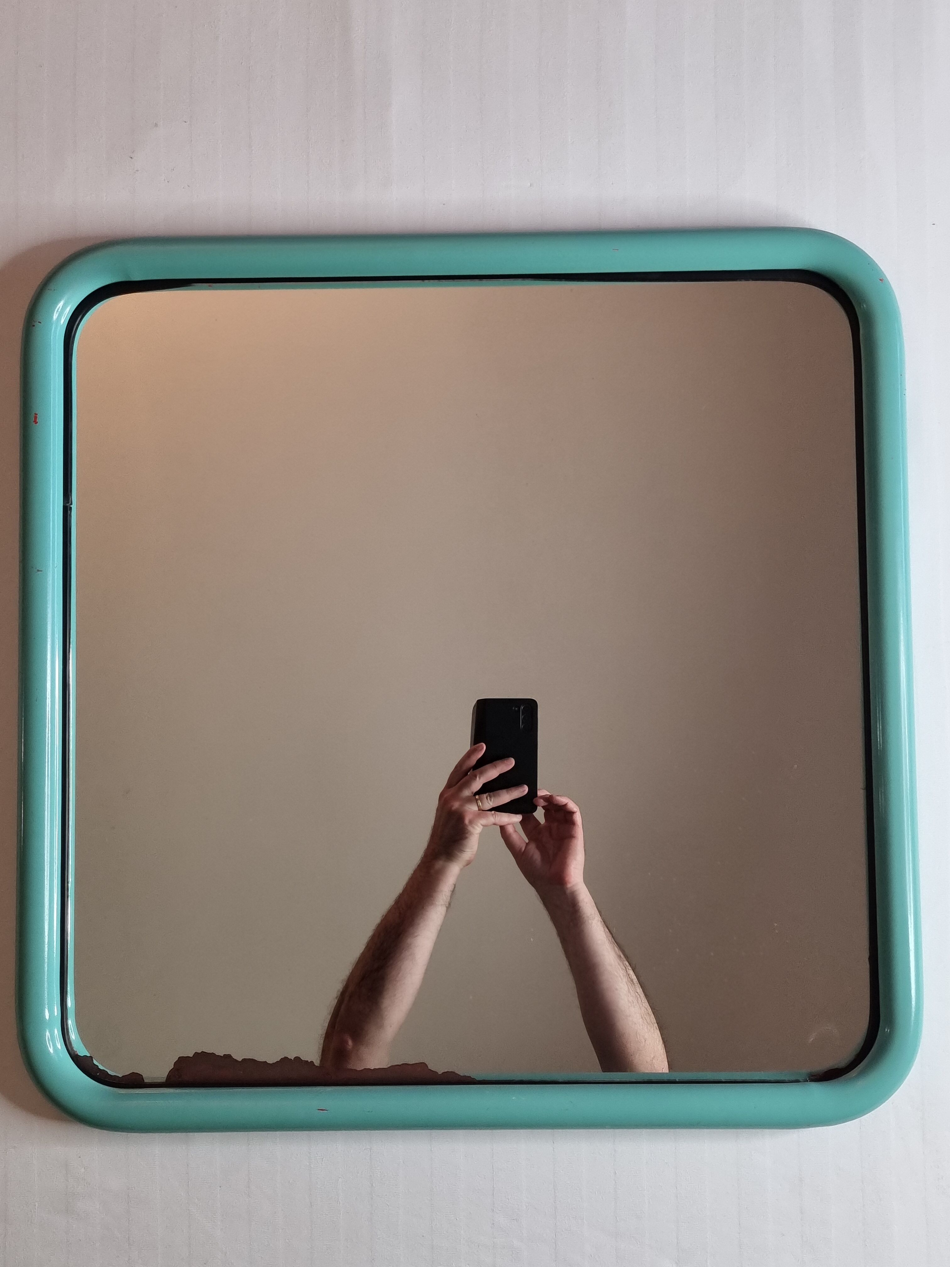 Vintage mirror in painted tubular steel of rectangular shape, 60 cm