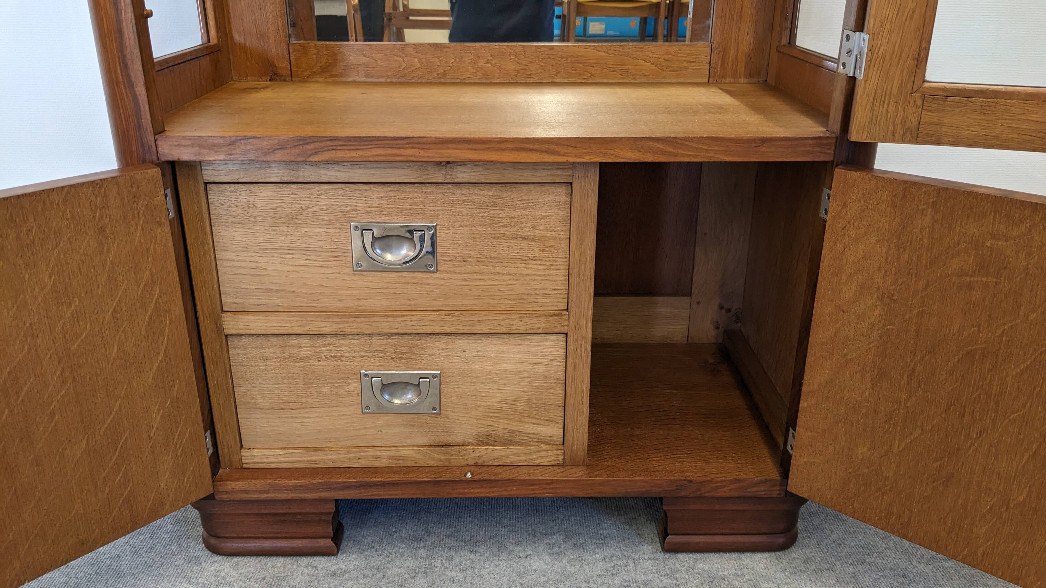 Art Deco walnut burl display cabinet, France circa 1930.
