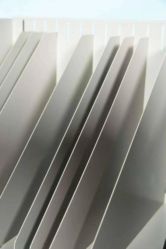 Vintage 1960s metal magazine rack, storage for single LPs.