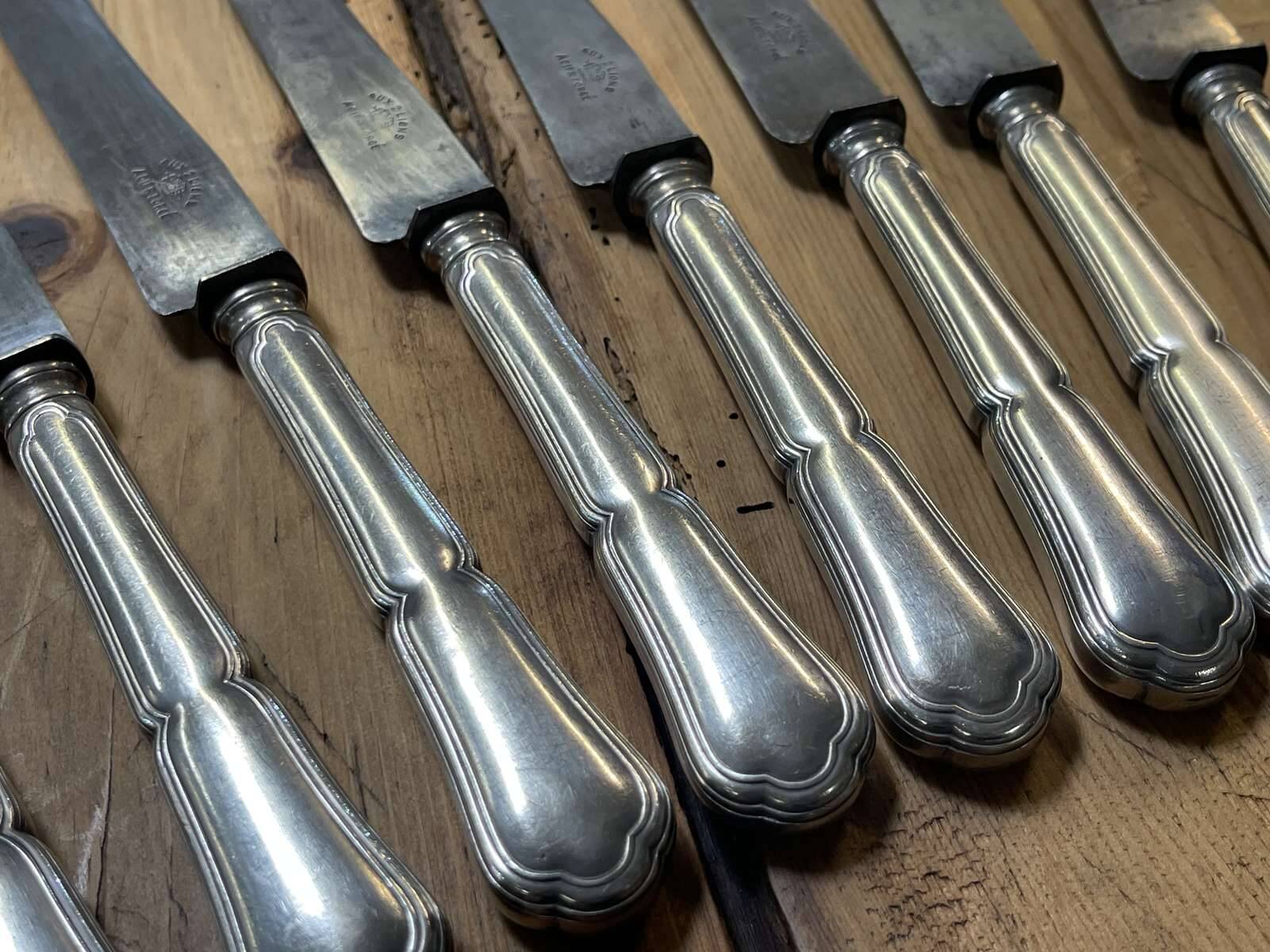 Set of 12 silver-plated metal knives with steel blades from the early 20th century