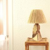 Brutalist sandstone lamp with raffia lampshade
