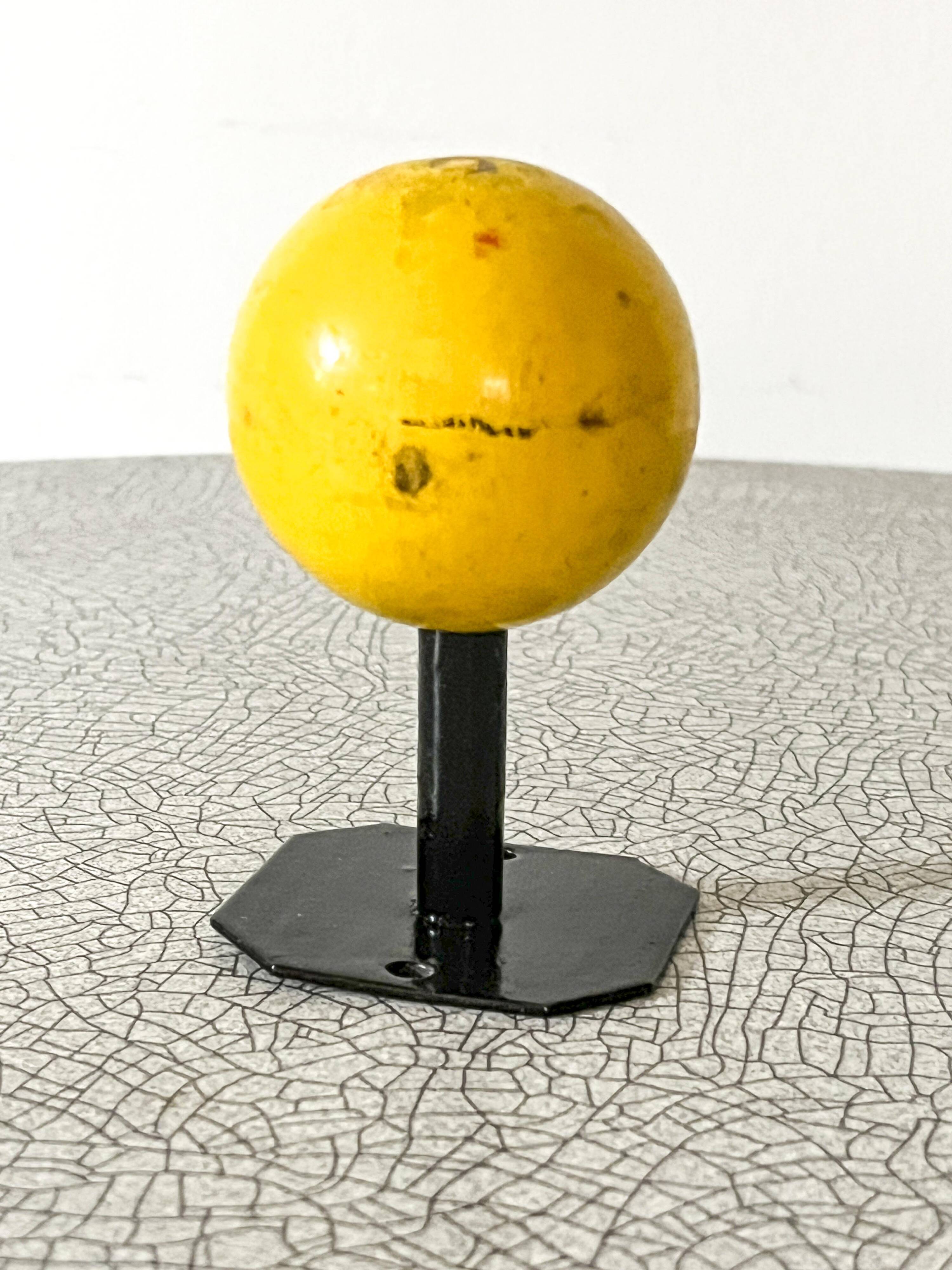 Vintage wall coat rack, metal and wood in yellow, 1 hook.