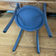 Curved wooden armchair from the late 19th/early 20th century.