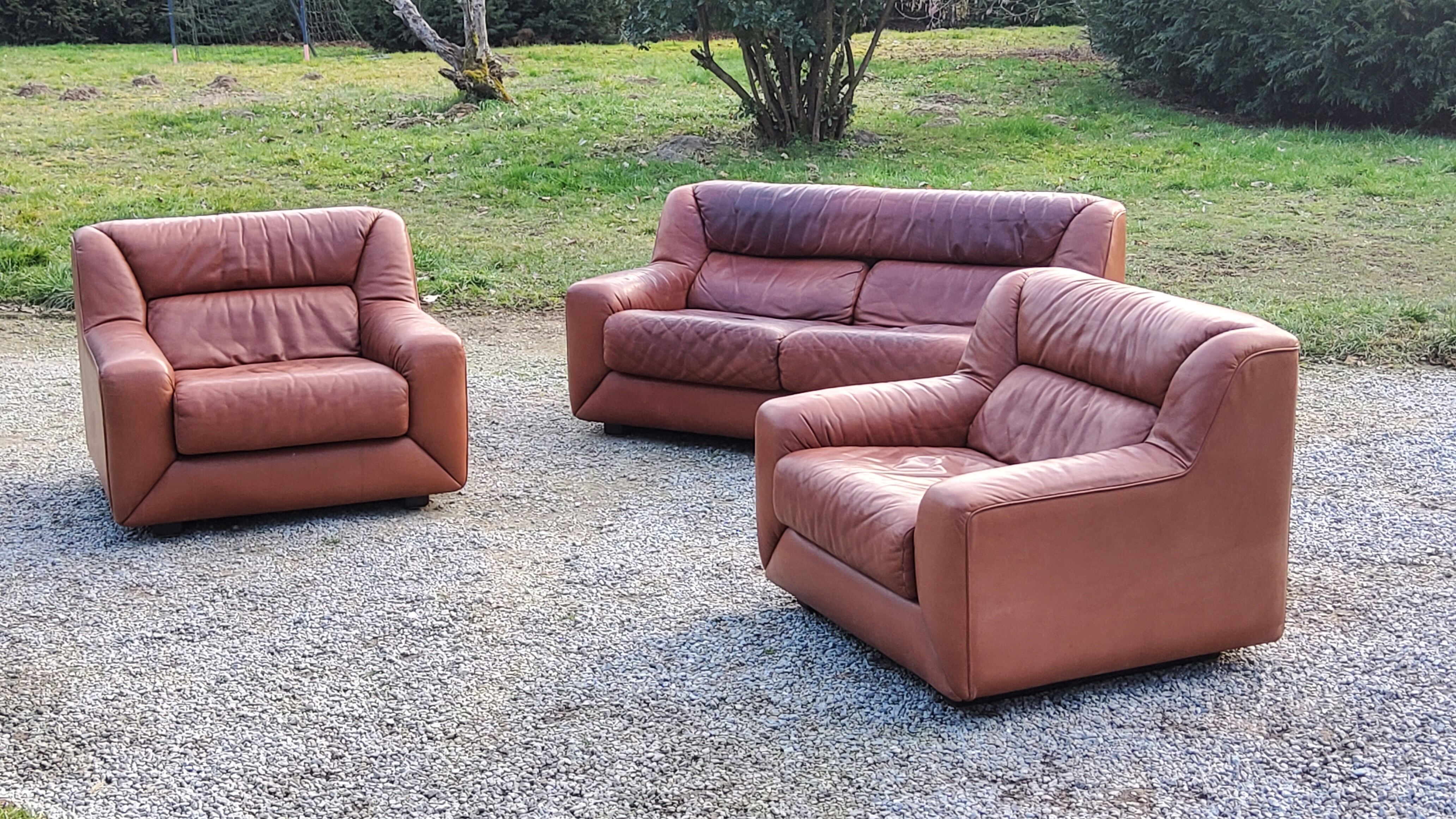 Pair of armchairs and De Sede sofa in cognac leather from the 70s/80s