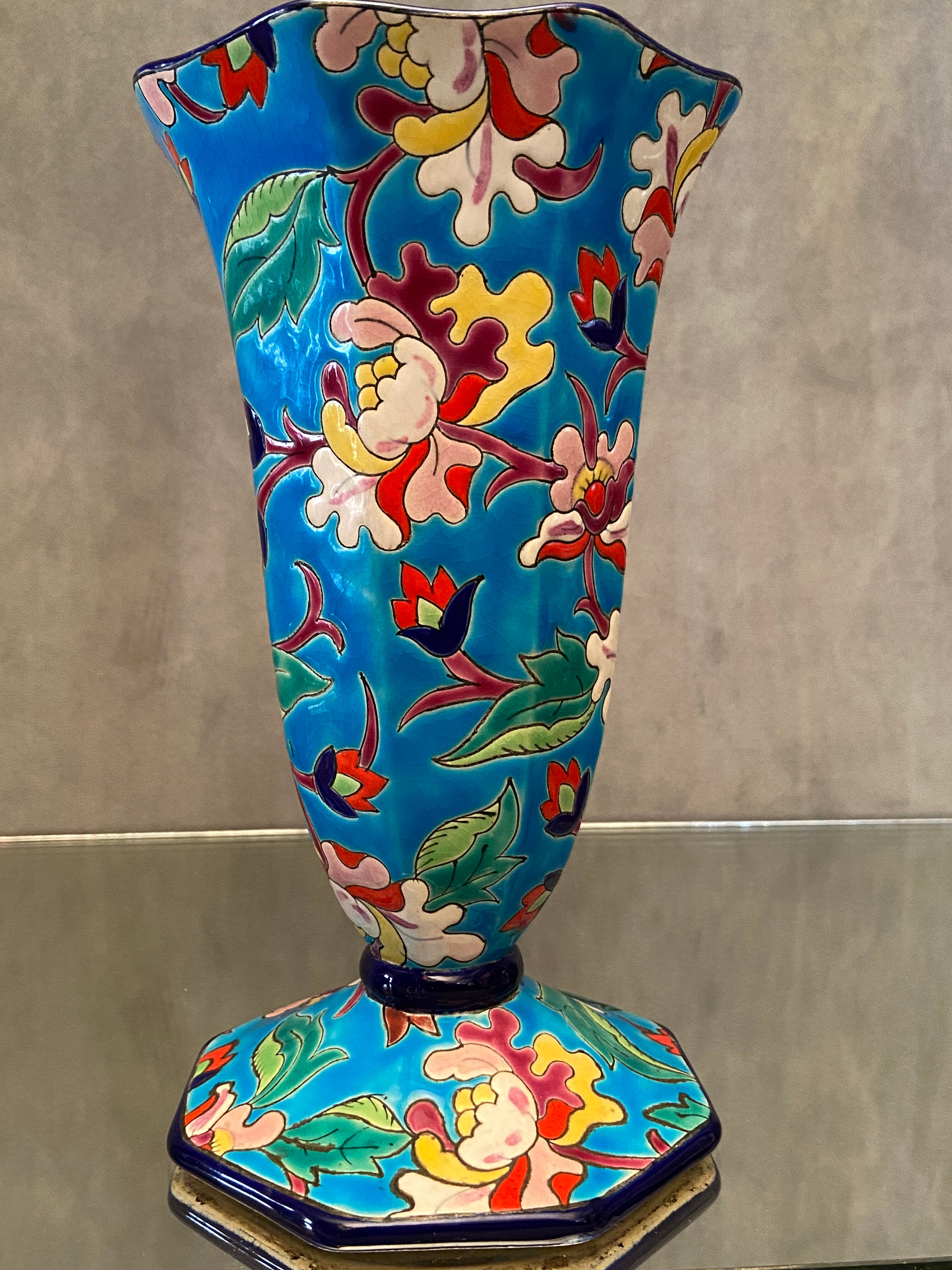 Faience cornet vase with floral decoration signed Emaux de Longwy