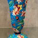 Faience cornet vase with floral decoration signed Emaux de Longwy