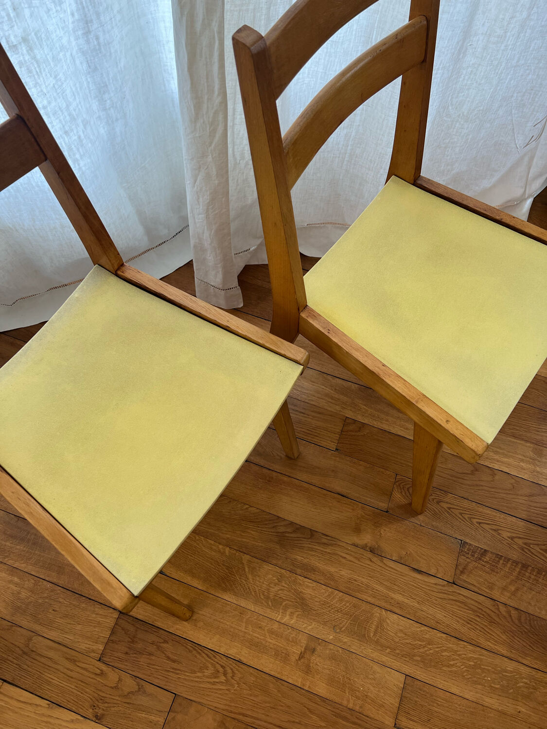 Vintage chairs in wood and skai legs from the 1950s