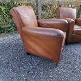 A couple of pairs of genuine restored club armchairs in industrial loft leather.