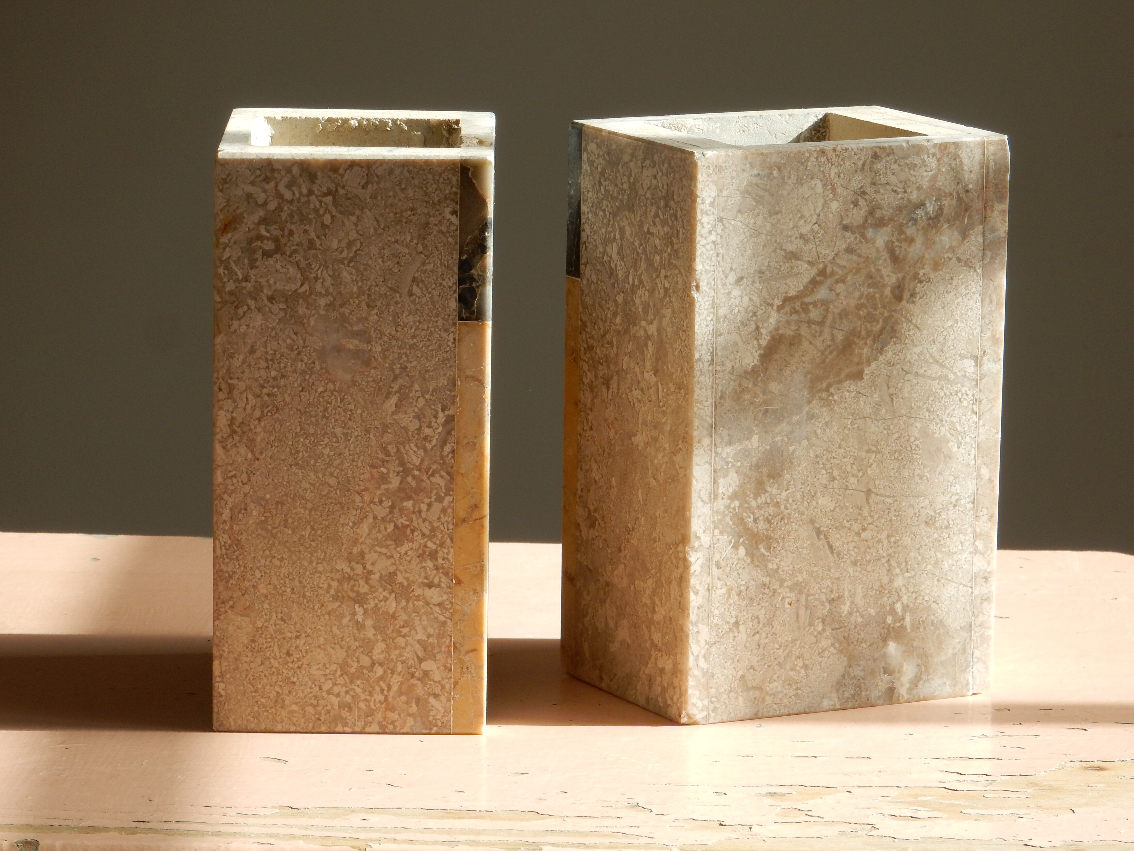 Pair of travertine and granite vases Art Deco