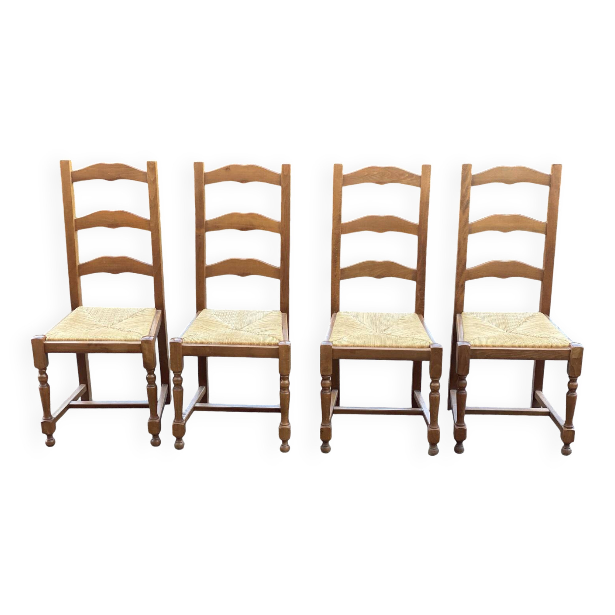 4 straw and solid wood chairs with high backs