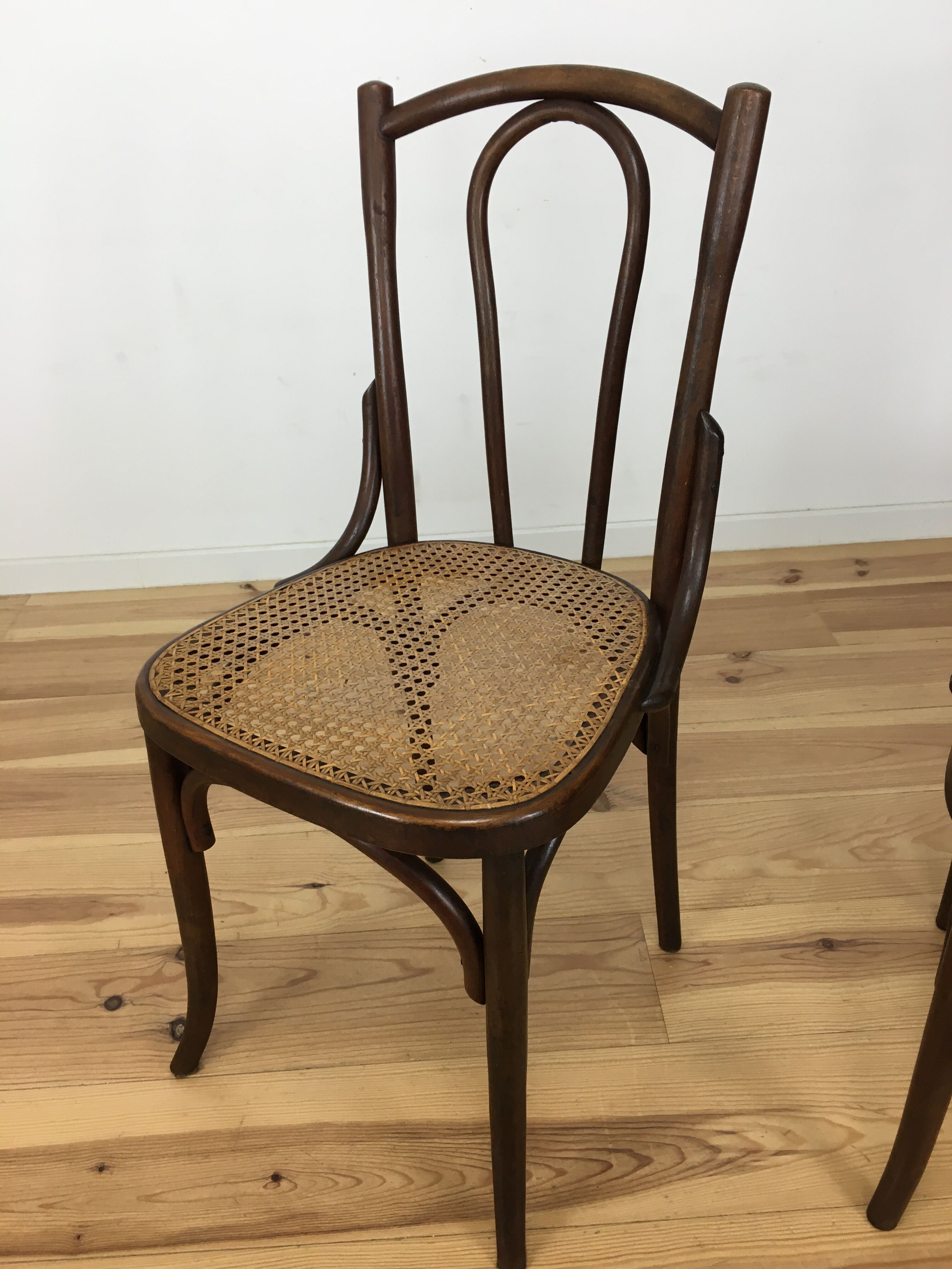 2 chairs in curved wooden and canning