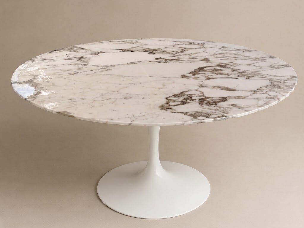 Eero Saarinen for Knoll. Round table Ø 137 cm, Calacatta marble, 2021.