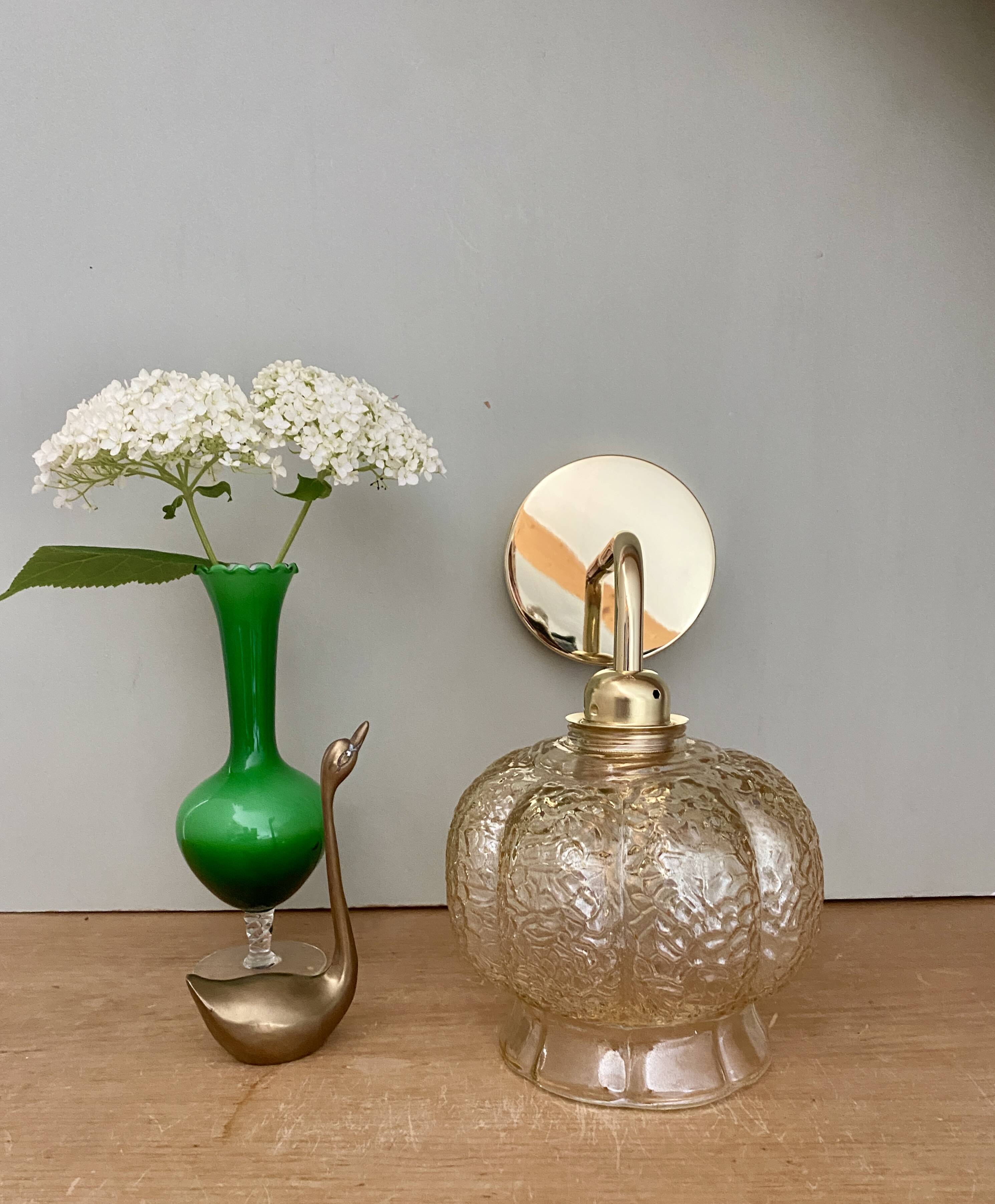 Vintage golden globe angled wall light in amber glass