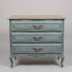 Louis XV style commode with a patina