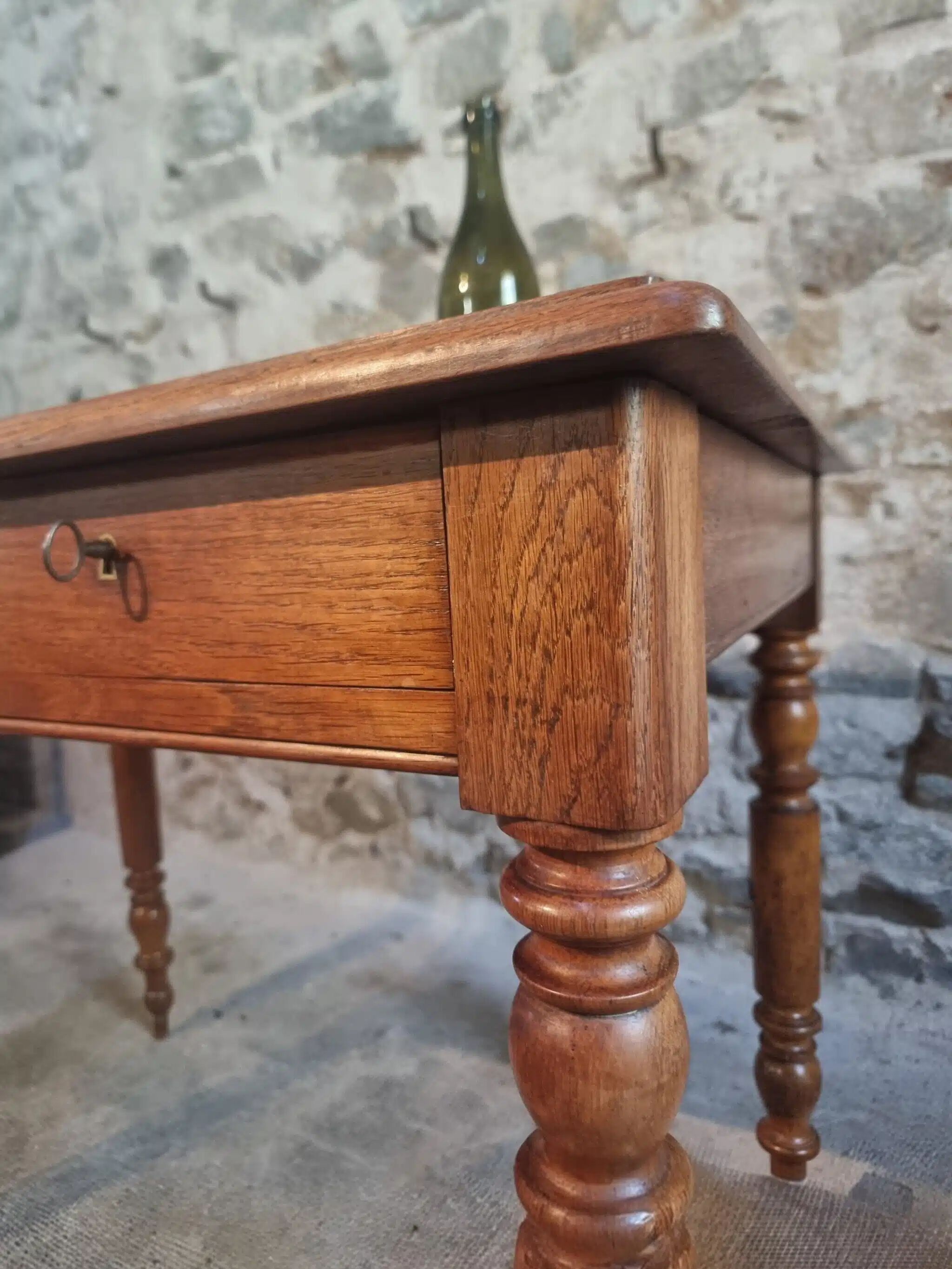 Antique French oak writing desk with 2 lockable drawers, circa 1920.