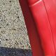 Fauteuil vintage des années 50 pieds compas moleskine rouge
