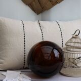 Embroidered linen cushion