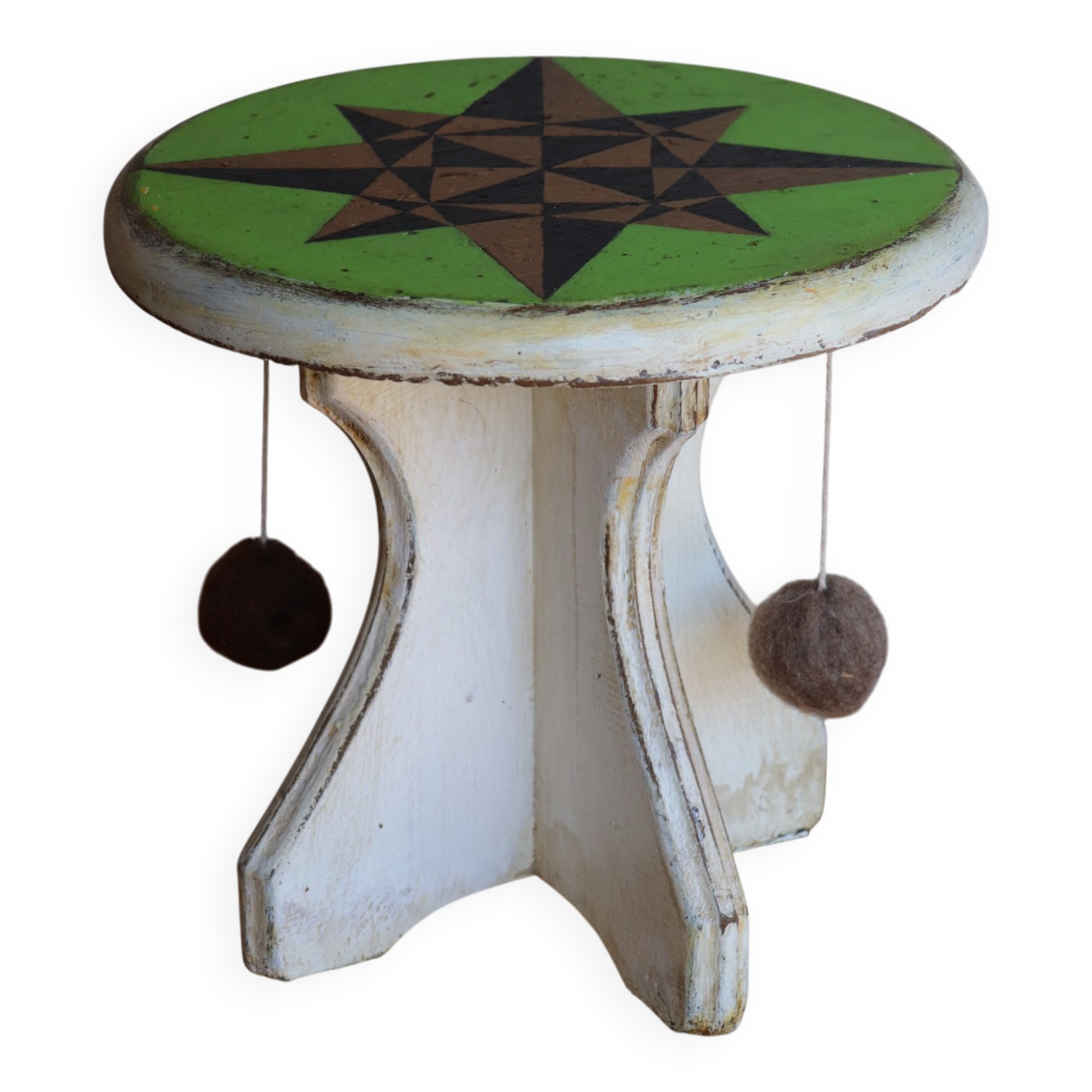 Small wooden stool painted with a star design.