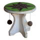 Small wooden stool painted with a star design.