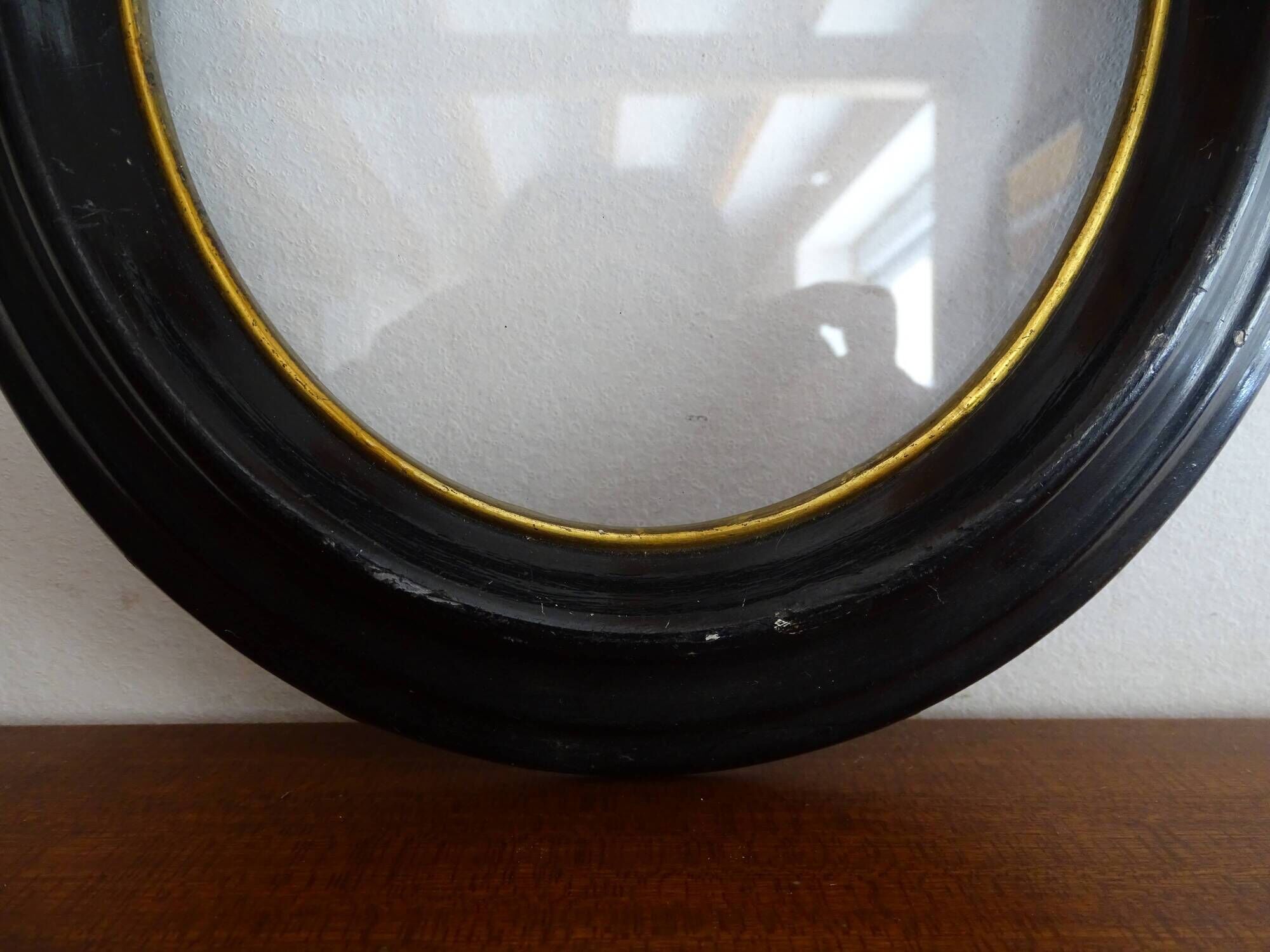 Oval frame Napoleon III blackened wood and blown glass glass glass 24 x 21.5