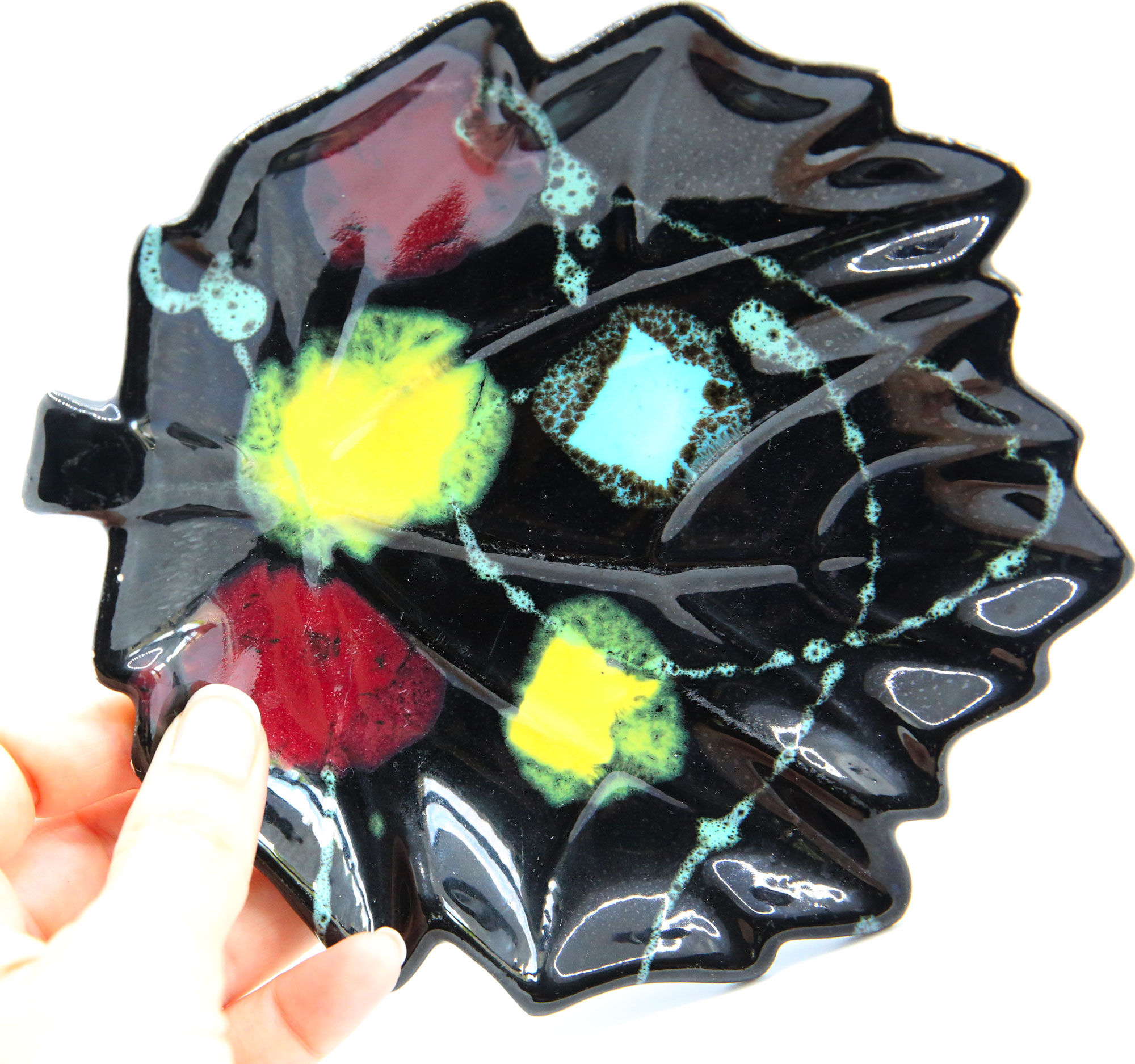 Pocket cup black ceramic sheet and abstract colored patterns fifties sixties