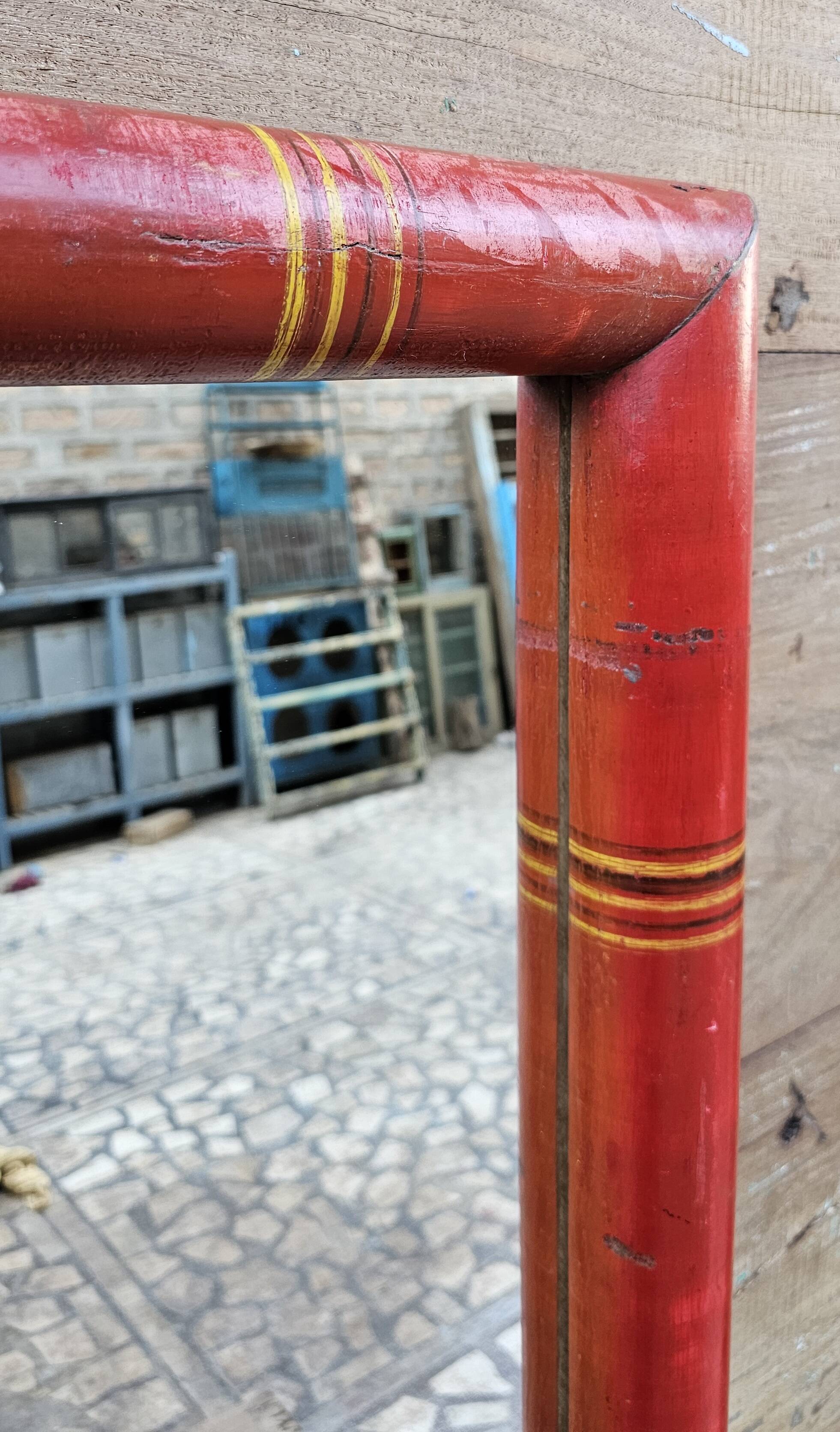 Antique mirror in Burmese teak.